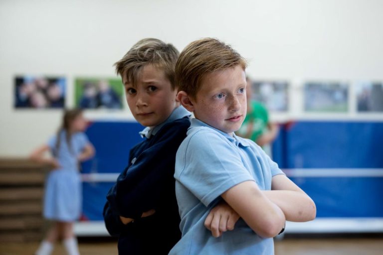 2 pupils performing in school anti-bullying drama workshop